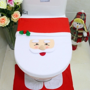 Detail of Santa Claus toilet seat cover and rug set with soft red and white flannel fabric