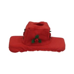 Detail of Santa toilet tank cover with festive holly leaves and red berry accent