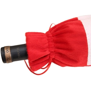 Festive red and white plush Santa wine bottle bag with adjustable drawstring for Christmas