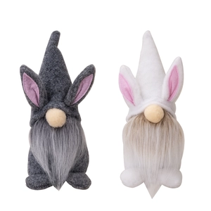 Easter bunny gnomes set with long beards and cute rabbit ears for festive table decor