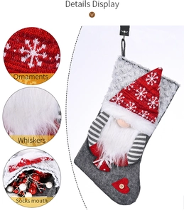 Detail of Christmas gnome stocking with snowflake knit hat and plush faux fur trim