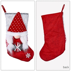 Front and back view of a red felt Christmas stocking featuring a 3D gnome with long beard