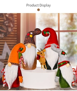 Detail of four festive Christmas gnomes and a reindeer doll with holiday patterns