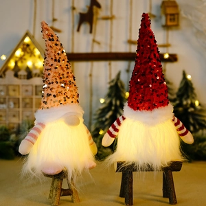 Lighted Christmas gnomes with sequin hats and warm LED glow for festive decor