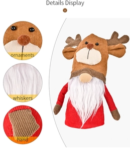 Detail showing the corduroy antlers and knitted fabric of the Christmas gnome doll