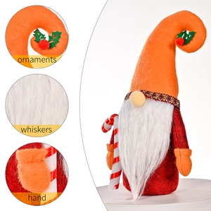 Christmas gnome plush ornament with long orange hook hat and white beard on white background