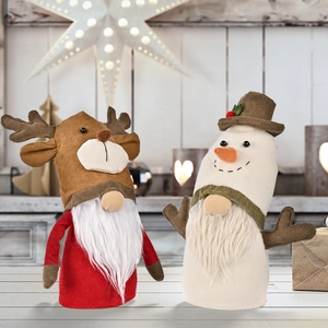 Set of two Christmas gnomes featuring reindeer and snowman designs in cozy corduroy