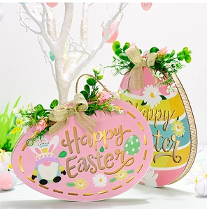 Detail of Easter egg wooden door sign with lit gnome patterns and Happy Easter text
