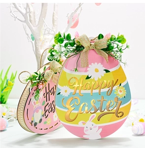 Close-up of decorative Easter egg wooden plaques with Happy Easter text and gnome motifs