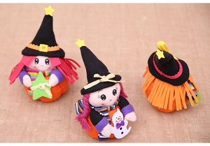 Detailed trio of Halloween pumpkin witch dolls with pointed hats and fringed hair decor