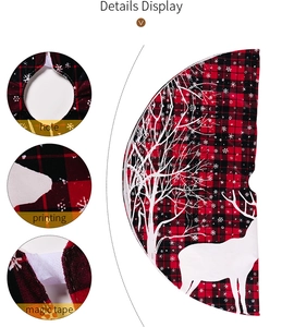 Detail display of buffalo plaid Christmas tree skirt with magic tape and elk printing