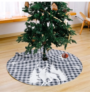 Detail of 120cm buffalo plaid Christmas tree skirt with white elk and snowflake prints