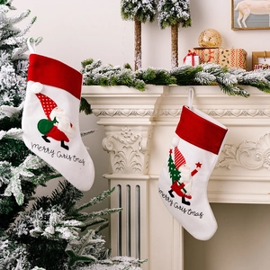 Plush Christmas stocking set with Merry Christmas embroidery and gnome patterns for tree hanging