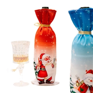 Christmas wine bottle covers featuring Santa and Snowman prints with gold ribbon ties