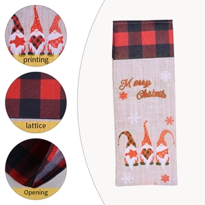 Christmas gnome wine bottle gift bag with red plaid trim and Merry Christmas print