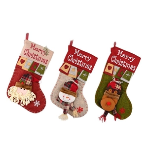 Three premium Christmas stockings featuring Santa, Snowman, and Reindeer 3D cartoon dolls
