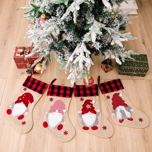 Set of 4 burlap Christmas stockings with gnome embroidery and red-black buffalo plaid cuffs