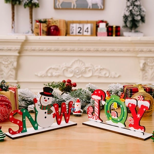 Festive Christmas wooden SNOW and JOY letter table decorations with snowman and wreath