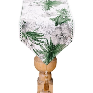 Christmas table runner with green watercolor floral prints and elegant brown tassels