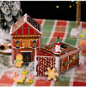 Christmas gingerbread house tin box with festive plaid pattern and holiday decor