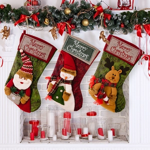 Set of 3 Christmas stockings with 3D Santa, snowman and reindeer on white fireplace