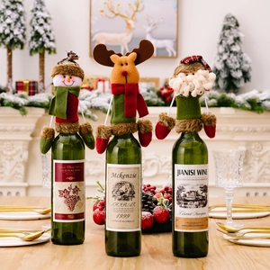 Christmas wine bottle covers featuring plush Santa, reindeer, and snowman holiday designs