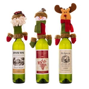Set of Christmas wine bottle covers featuring Santa, Snowman and Reindeer characters
