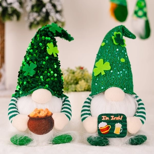 St. Patrick's Day gnomes plush with sequin green hats and shamrock details in soft lighting