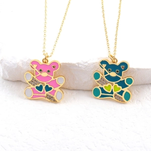 Detail of colorful enamel bear pendants with micro-pave zircons on gold chains