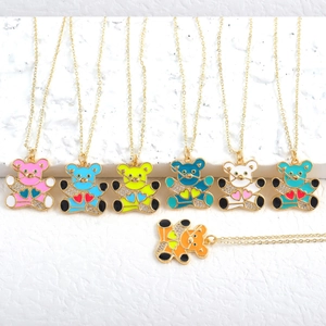 Colorful bear pendant necklaces with zircon heart detail on gold chain in seven colors