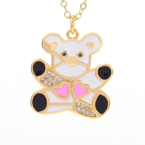 Detail of bear pendant with white enamel, zircon pavé paws, and pink hearts
