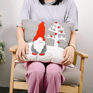 Grey and white gnome Christmas pillow cover with embroidered white tree and red hat