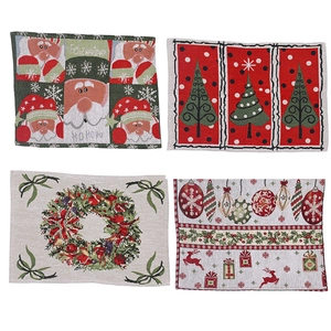 Set of four knitted Christmas placemats with Santa and reindeer holiday designs