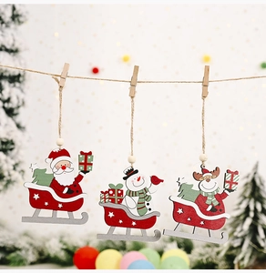Three pieces of Christmas wooden sled pendants featuring Santa, Snowman, and Reindeer
