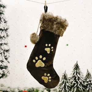 Chaussette de Noël en suédine marron avec empreintes de pattes en paillettes dorées