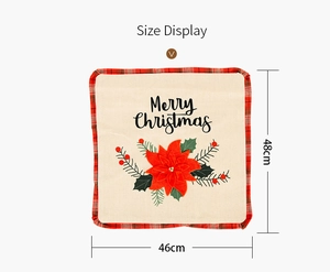 Detailed view of Merry Christmas pillow cover with red poinsettia and 48x46cm size dimensions