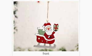 Front view of a wooden Santa Claus sleigh ornament with green tree and jute rope hanger