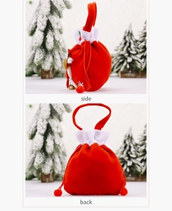 Detailed side and back views of red velvet Christmas gift bag with plush white trim