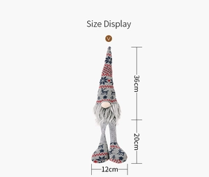 Size display of a grey Christmas gnome plush with knitted reindeer patterns and long legs