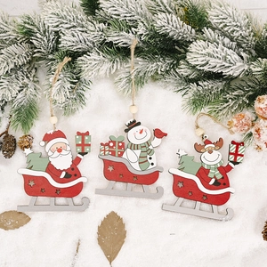 Set of 3 wooden Christmas sled ornaments featuring Santa, Snowman, and Reindeer hanging icons