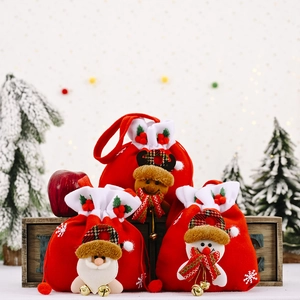 Velvet Christmas gift bags featuring Santa, Reindeer and Snowman plush designs