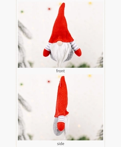 Front and side view of a Christmas gnome plush ornament with red striped arms
