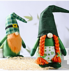 Detailed view of St. Patrick's Day gnomes with green shamrocks and orange beards decor