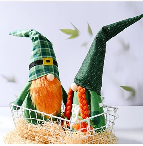 Detail of St. Patrick's Day plush gnomes in a white wire basket with rustic hay texture