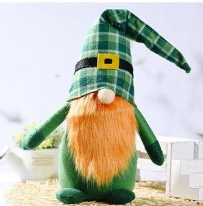Macro shot of St. Patrick's Day gnome featuring a green felt hat and long orange beard