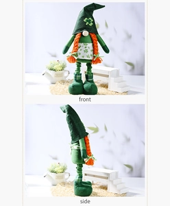 Front and side view of St. Patrick's Day gnome with green clover hat and orange beard