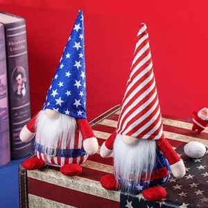 Detail of Fourth of July gnomes with US flag patterns on a vintage starry suitcase