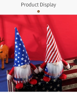 Detail of USA Independence Day gnomes with stars and stripes patterns on a vintage box