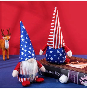 Detail of 4th of July gnomes with American flag patterns on a blue and red backdrop