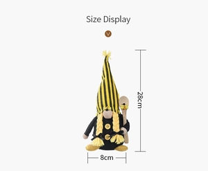 Detailed size view of bee gnome doll showing 28cm height with yellow braids and striped hat